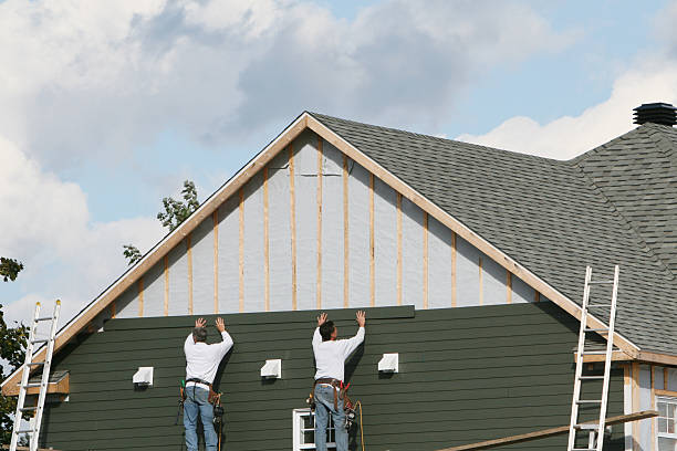 Professional Storm Damage Siding Repair technician working in Bryn Athyn, PA